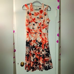 Beautiful floral dress in white, coral, red and black. Roz and Ali brand, size 6